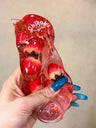 A tube of strawberry jam